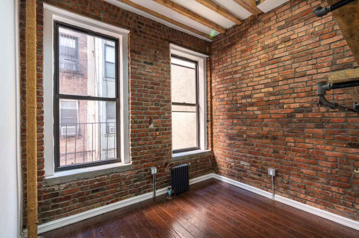 Want exposed brick? There’s plenty of it in this Chinatown two bedroom